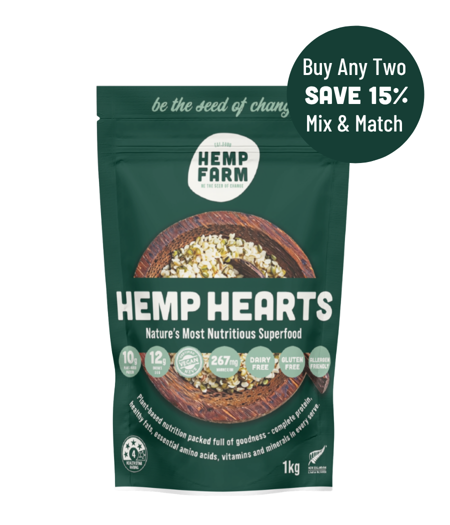 A 1kg pouch of Hemp Farm Hemp Hearts superfood on a white background, featuring a dark green bag with a bowl of hemp hearts, a promotional badge in the top right, and product benefits icons.
